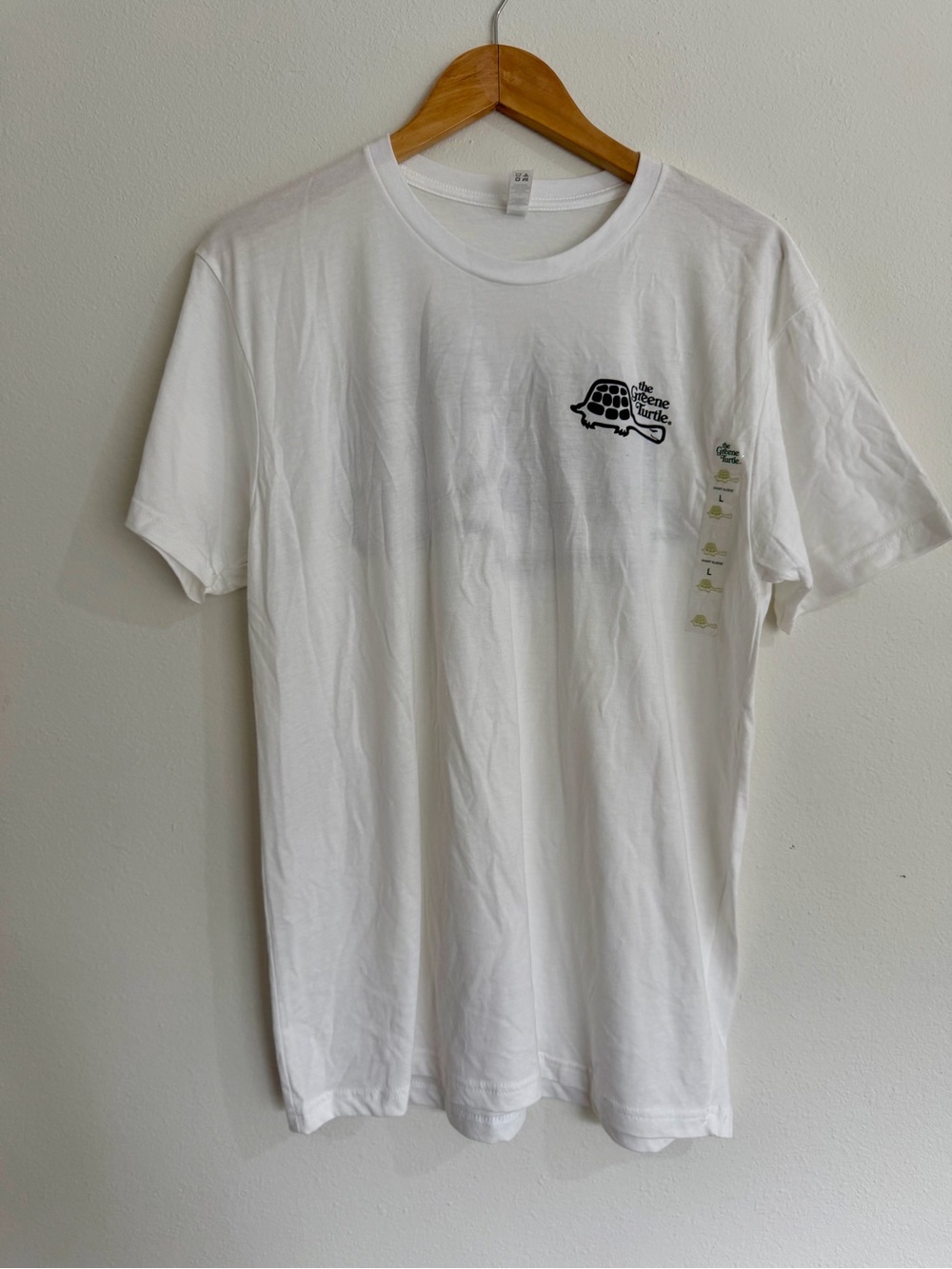 Next Level Apparel White Short-Sleeve Tee with Small Black Turtle Logo